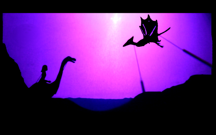 photographie extraite du spectacle le rêve d'Ambre, Ambre à l'époque des dinosaures, rencontre avec le Ptérodactyle